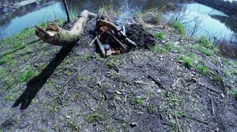 Fire on bank of river Vídeos de archivo 49209289