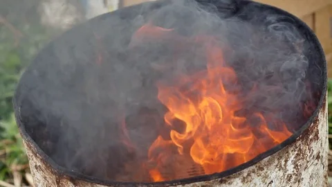 Fire in Barrels Oil Tank Stock Footage