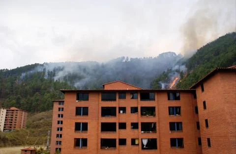 Fire behind apartment complex Stock Photos