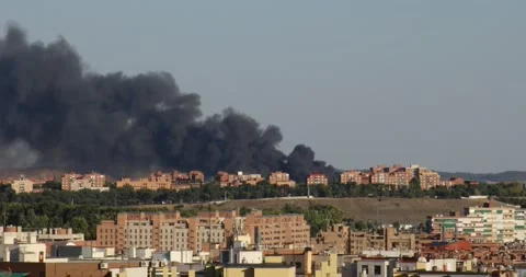 Fire behind buildings in the city Stock Footage 285949692