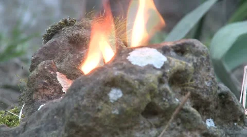Fire behind a stone Stock Footage 2850215