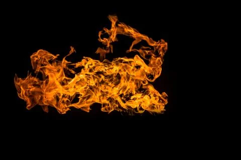Fire on black background. Fiery patterns. Burning flame. Blazing fire.. Photos