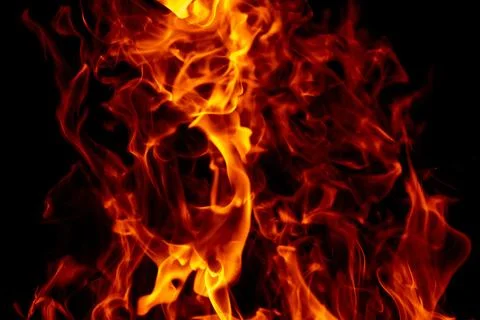 Fire on black background. Fire sparks. Fire fiery effect. Fire glowing effect. Stock Photos