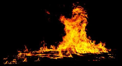 Fire on black background Stock Photos