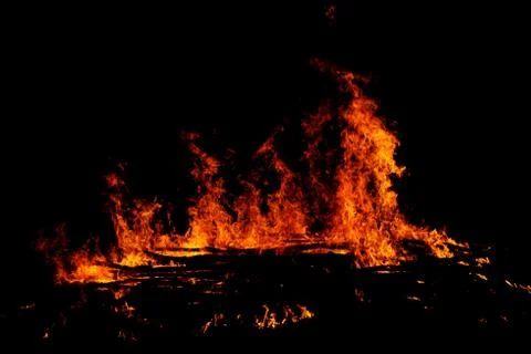 Fire on black background Stock Photos