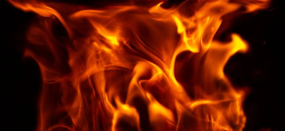Fire on a black background Stock Photos