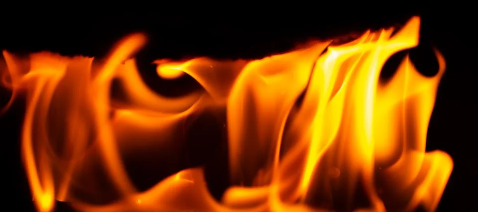 Fire on a black background Stock Photos