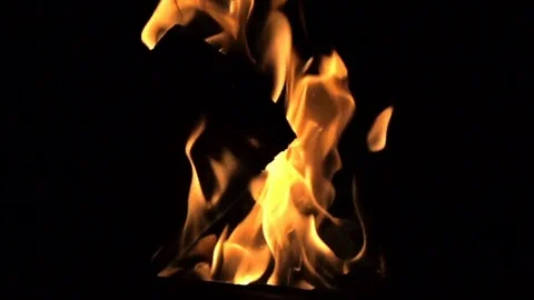Fire on a black background, slow motion video, slow motion, duplication on Stock Footage 84134149