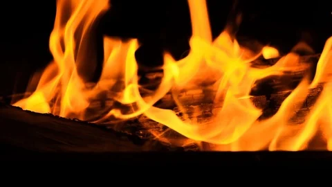 Fire on a black background. Slow motion. Stock Footage 113993671