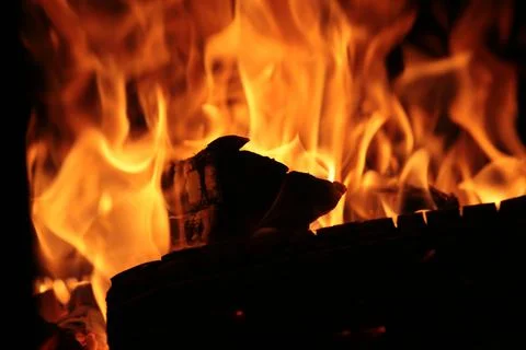 Fire on black close up abstract background Stock Photos