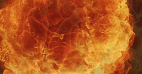 Fire blasts on black background. Flying Embers. Closeup of burning Stock Footage 261459054