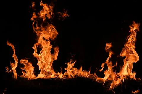 Fire blaze flames on black background. Fire burn flame isolated, abstract Foto stock