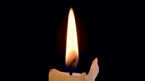 The fire blazes and burns perfectly smoothly. Burning candle and flame Stock Footage 163300095