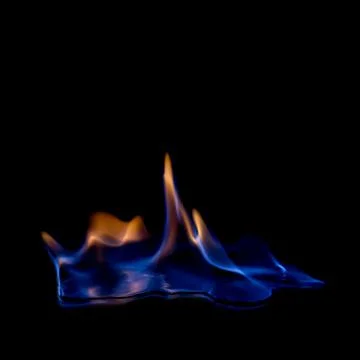 Fire blue hot on black background Stock Photos