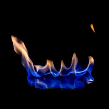 Fire blue hot on black background Stock Photos