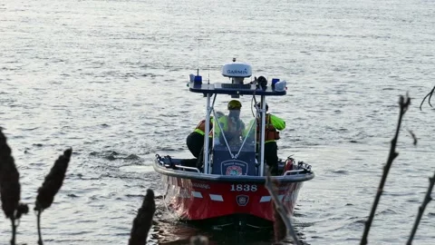 Fire boat with fire rescue team on the water Stock Footage 139658857