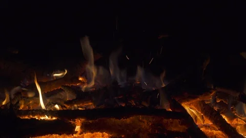 Fire on bonfire red-hot coals close up. 4K UHD video footage Stock Footage 98486431