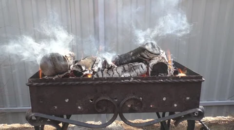 The fire in the brazier burning firewood Stock Footage 62929602