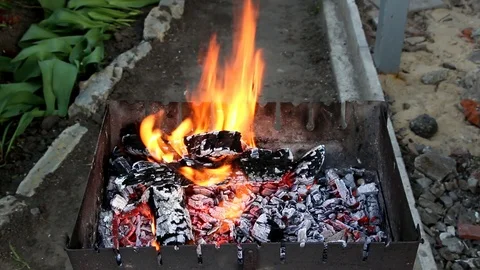 The fire in the brazier, stirring coals Stock Footage 90868271