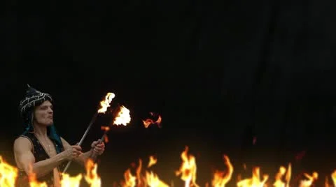 Fire breather on a black background Stock Footage 20474016