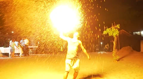 Fire breathing guy on beach in Philippines Stock Footage 67556995