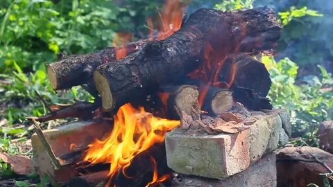 The fire on the bricks. Smoke. Background Stock Footage 75570511