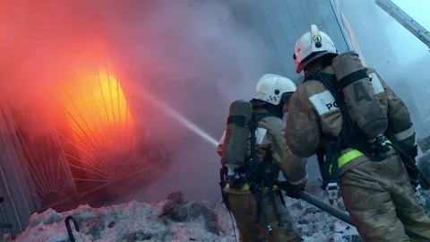 Fire brigade is fighting with fire. Stock Footage 72913133