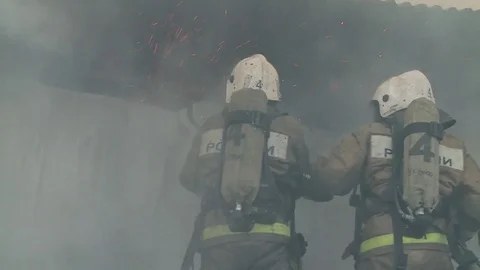 Fire brigade is fighting with fire. Video stock 72913134