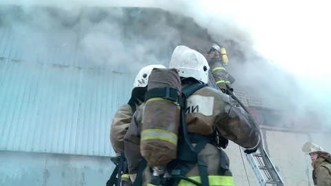 Fire brigade is fighting with fire. Stock Footage 72913135