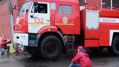 Fire Brigade Goes Through Rigorous Professional Aptitude Test. On Red Firetruck Stock Footage 143745038