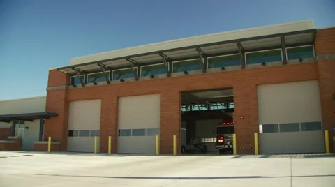 Fire brigade leaving from fire station Stock Footage 55571748