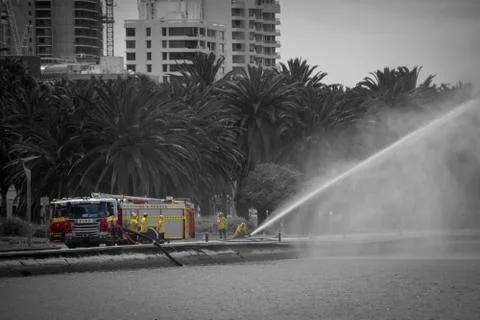 Fire brigade rescue practicing in Perth at the seaside in black and white and Stock Photos