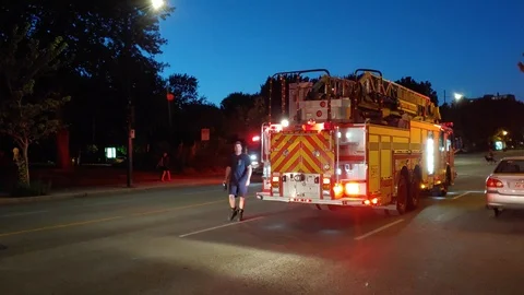Fire brigade vehicle heading towards the incident spot at night - 2018 - 2019 Stock Footage 117063538