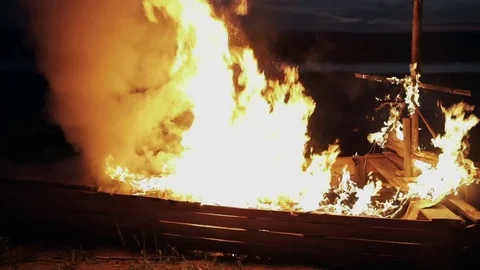 Fire brightly burns in the night Stock Footage 82347682
