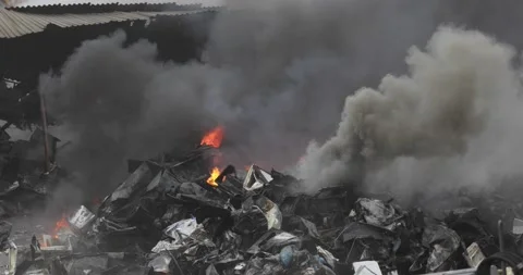 A fire broke out at a recycling centre. Stock Footage 166392886