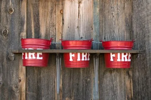 Fire buckets Stock Photos