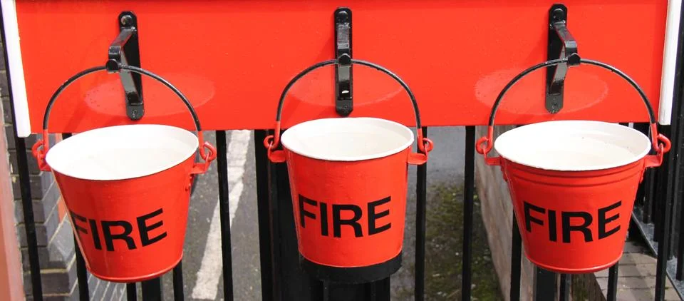 Fire Buckets. Stock Photos