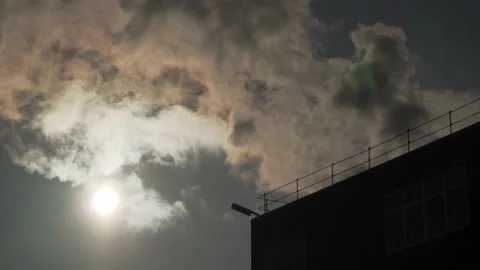 Fire in the building in winter. Smoke comes from the roof Stock Footage 149145961