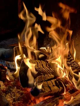 Fire Buring Over Wood Stock Photos