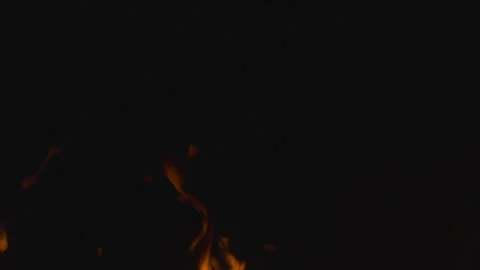 Fire burning and flame glowing on black background Stock Footage 247815379