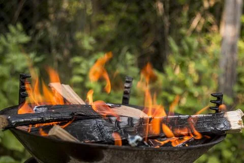 Fire burning in a barbecue close-up. 스톡 사진