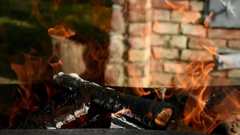 Fire burning with barbecue grill in background 動画素材 91504216