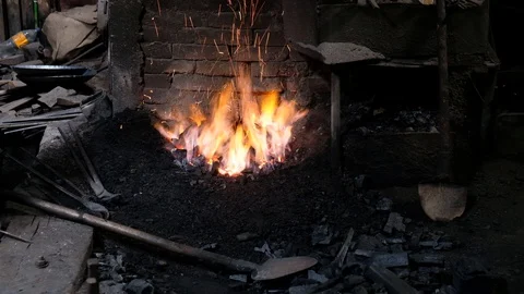 Fire burning in blacksmith's workshop Stock Footage 130143756