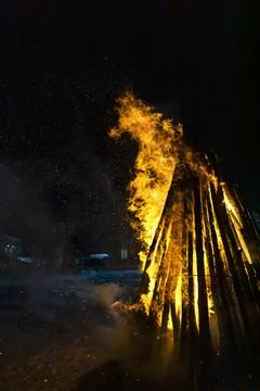 Fire, a burning bonfire. A flame of fire with sparks. The concept of fire and Stock Photos