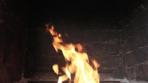 Fire burning in a brick fireplace Stock Footage 136464791