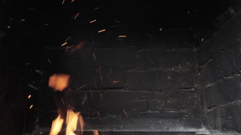 Fire burning in a brick fireplace Video stock 136469388