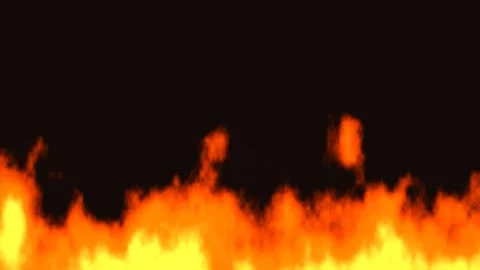 Fire burning with bright flames and dark background at Stock Footage 338226993
