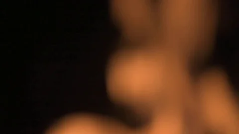 Fire burning in chimney or fireplace blurred bokeh Stock Footage 74797584