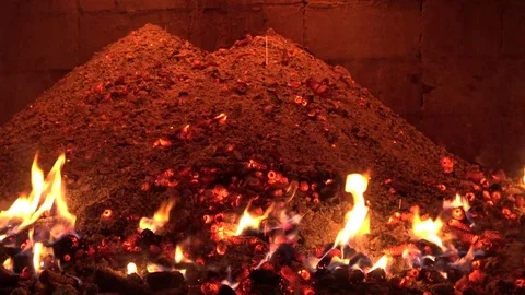 Fire burning corn cobs under the stove. Stock Footage 70054373
