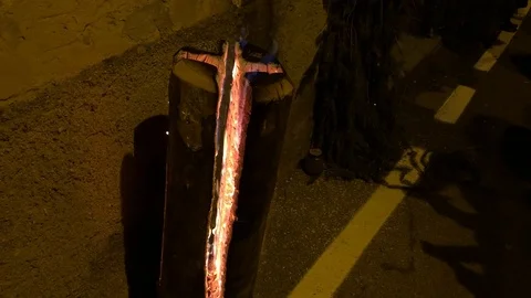 Fire burning in a cross-shaped branch at night Stock Footage 101626699